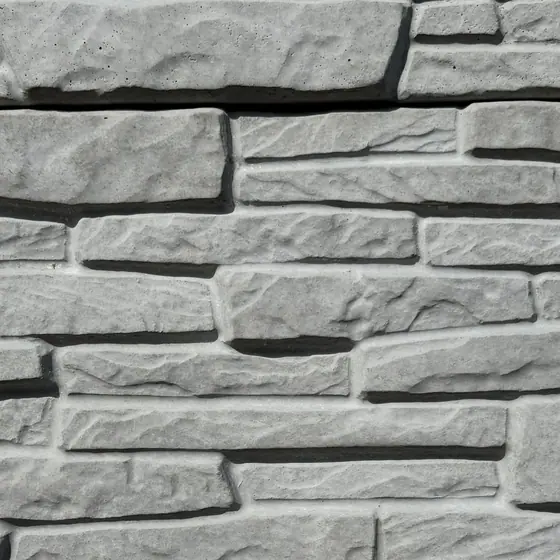 Heritage Stone texture on grey concrete, close-up