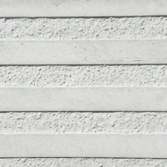 Urban texture in white on grey concrete, close-up