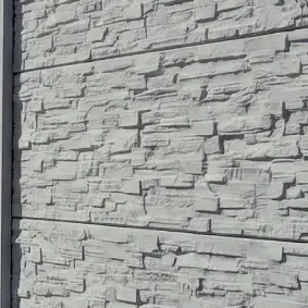 Alpine texture in grey concrete, close-up